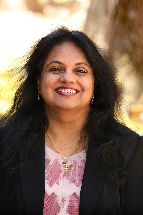 Aruna T.