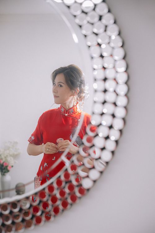 Chinese bride getting ready for traditional tea ceremony