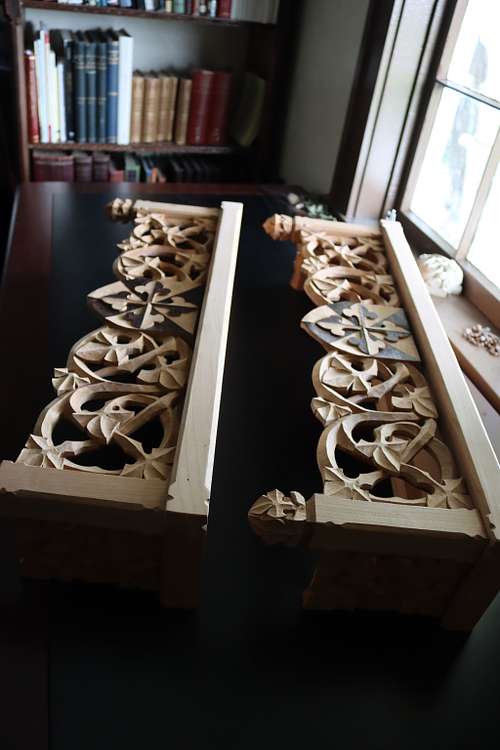 The shelves from another angle showing the beautiful carving