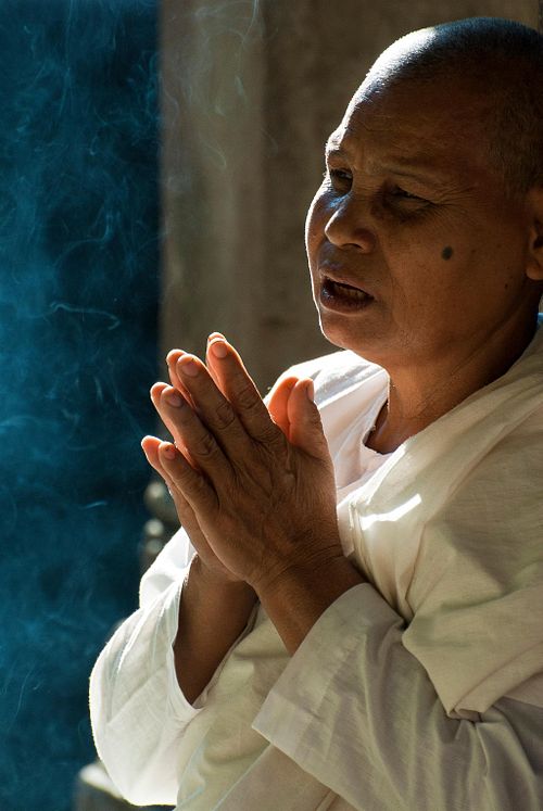 Man in prayer. Siem Reap, Cambodia.