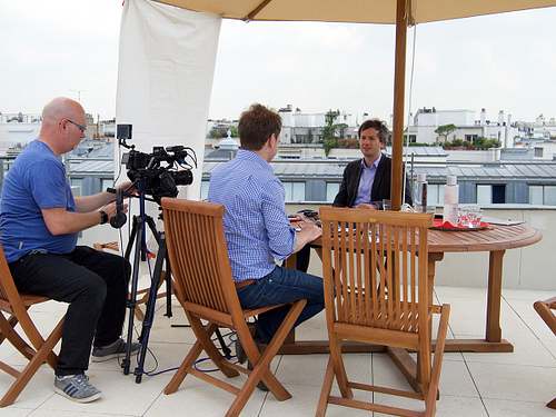 Filming across 15+ US and EMEA offices. Paris here.