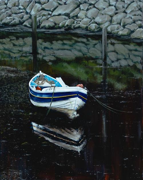 small boat in Staithes harbour inlet