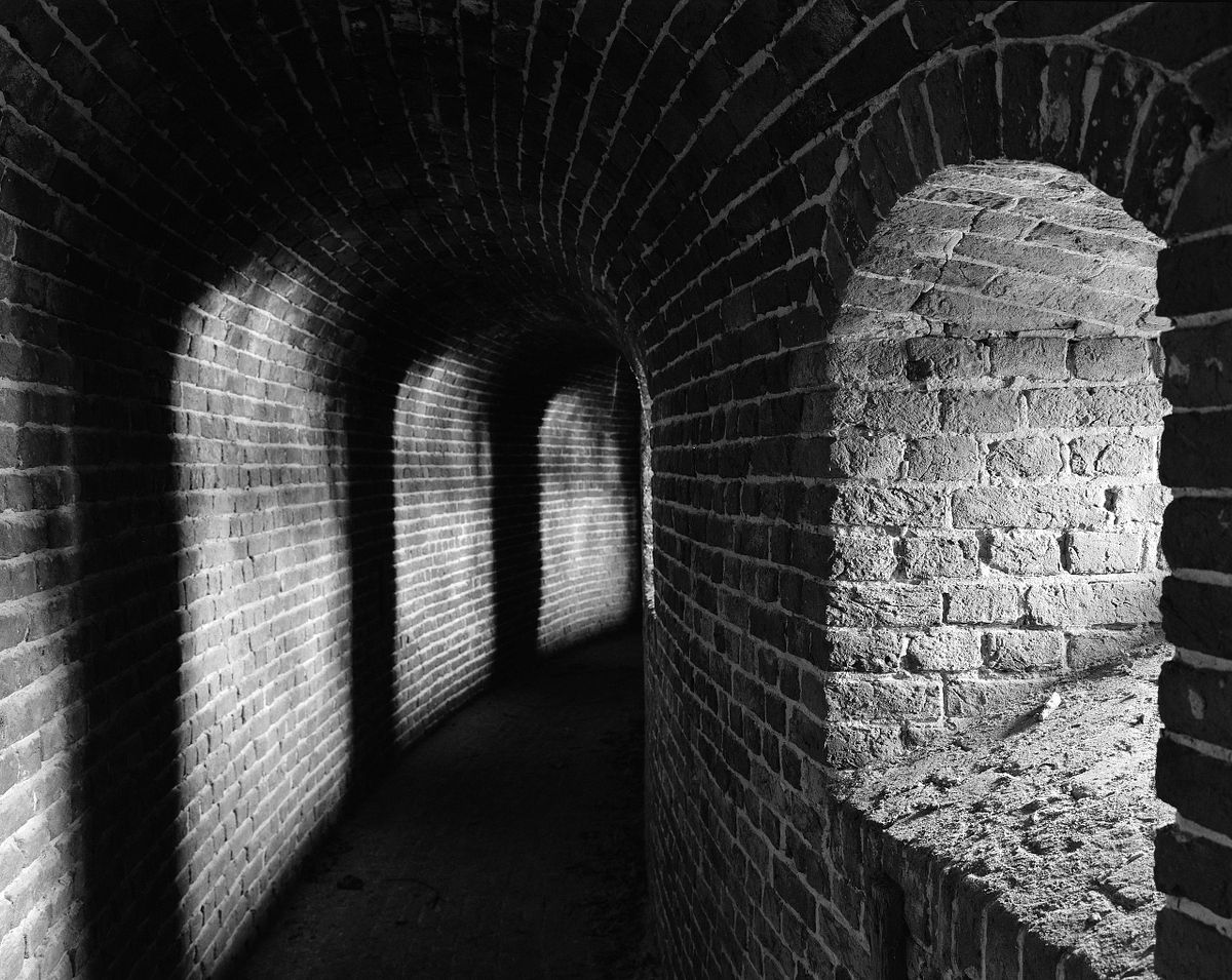 Narrow passage underneath battle platform at Fort V