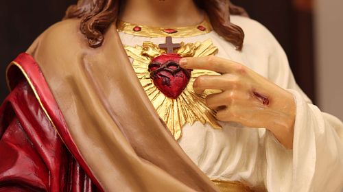 Detail of the Sacred Heart on the statue that was restored