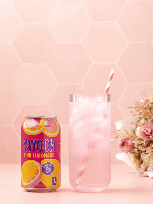 Stop motion animation of a pink lemonade drink filling up in a cup