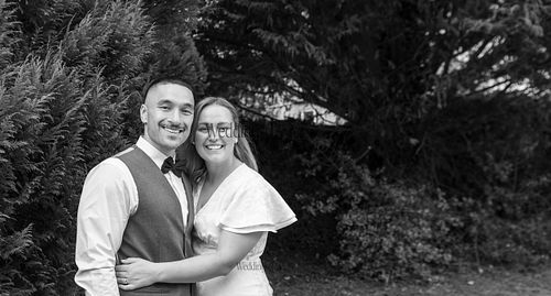 Bride-and-groom-listening-to-officiant-at-Oakham-Registry-Office