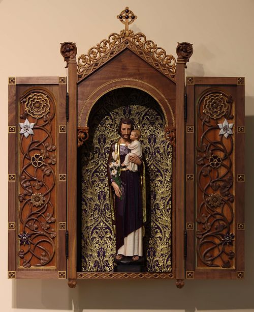 Fully restored statue of St. Joseph and the Child Jesus in a custom, hand-carved shrine in St. Bernadette Catholic Church in Lancaster, Ohio