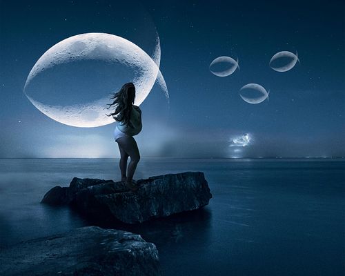 Pregnant mama standing on a rock watching moon fish swim across the sky.