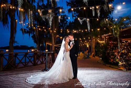 Moonlight wedding portrait at Paradise Cove Orlando by Legacy of Love Photography.