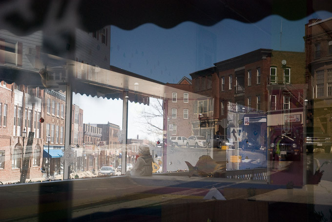 Gardner main street as reflected in empty store window