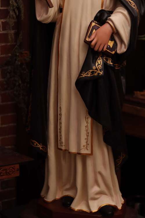 Overview of the custom, hand-painted trim on the restored statue of St. Rose