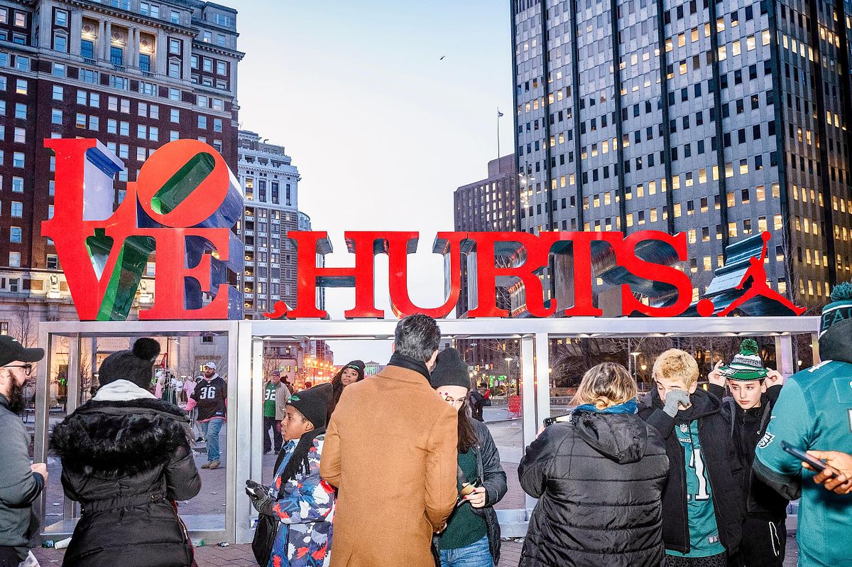 Editorial event photography capturing the “Love Hurts” installation in Philadelphia’s LOVE Park, blending civic pride, artistry, and community storytelling in the city’s historic center.