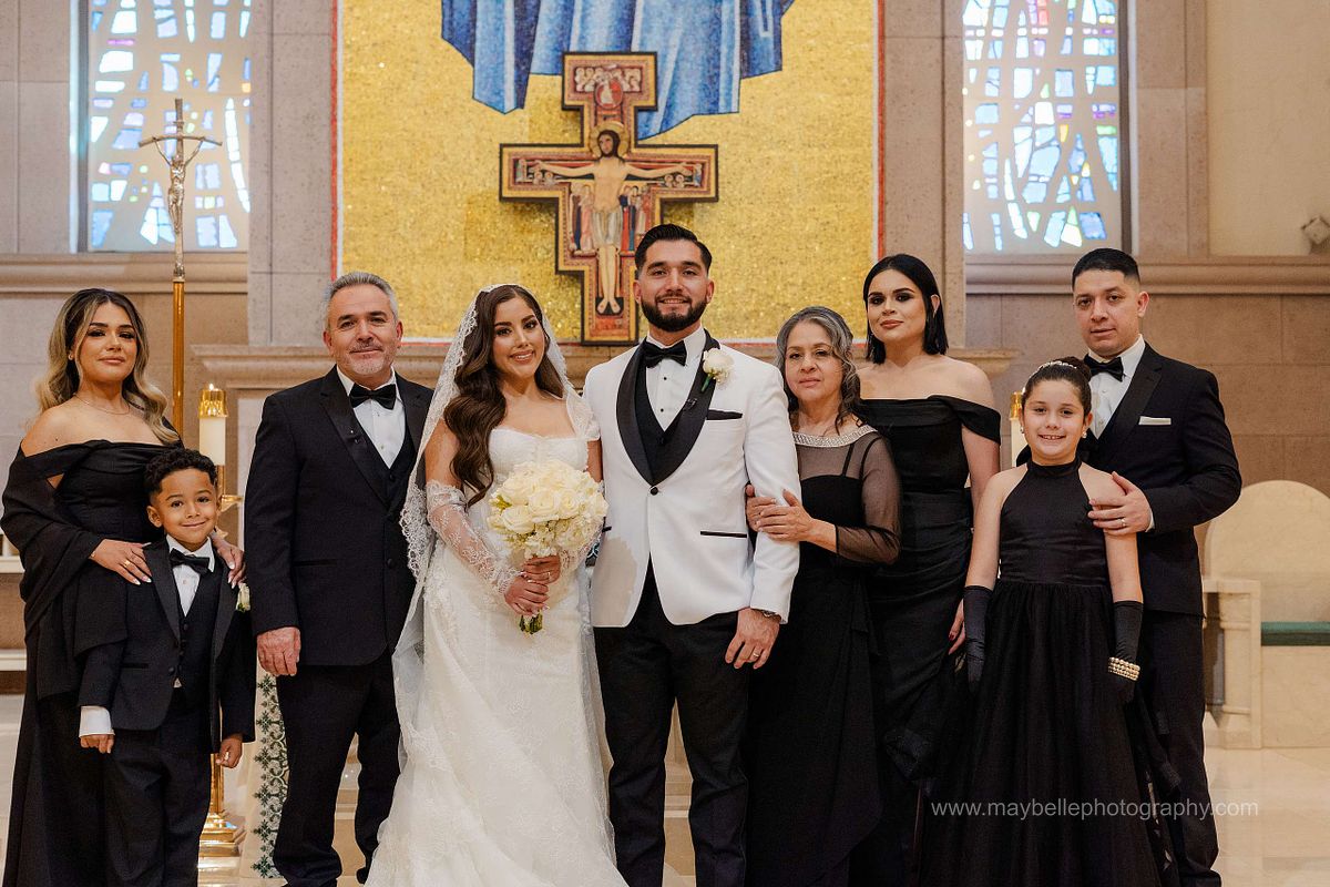 Exchanging vows at Saint Joseph, Husband of Mary Roman Catholic Church in Las Vegas Wedding Photography