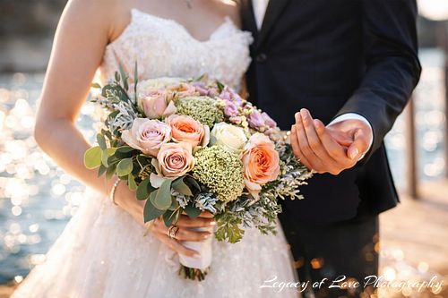 A romantic beach wedding couple at sunset in Florida, served by Legacy of Love Photography across St. Augustine, Jacksonville, Orlando, and Gainesville.