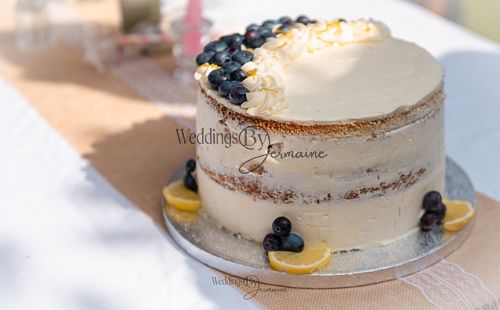 Bride-and-groom-listening-to-officiant-at-Oakham-Registry-Office