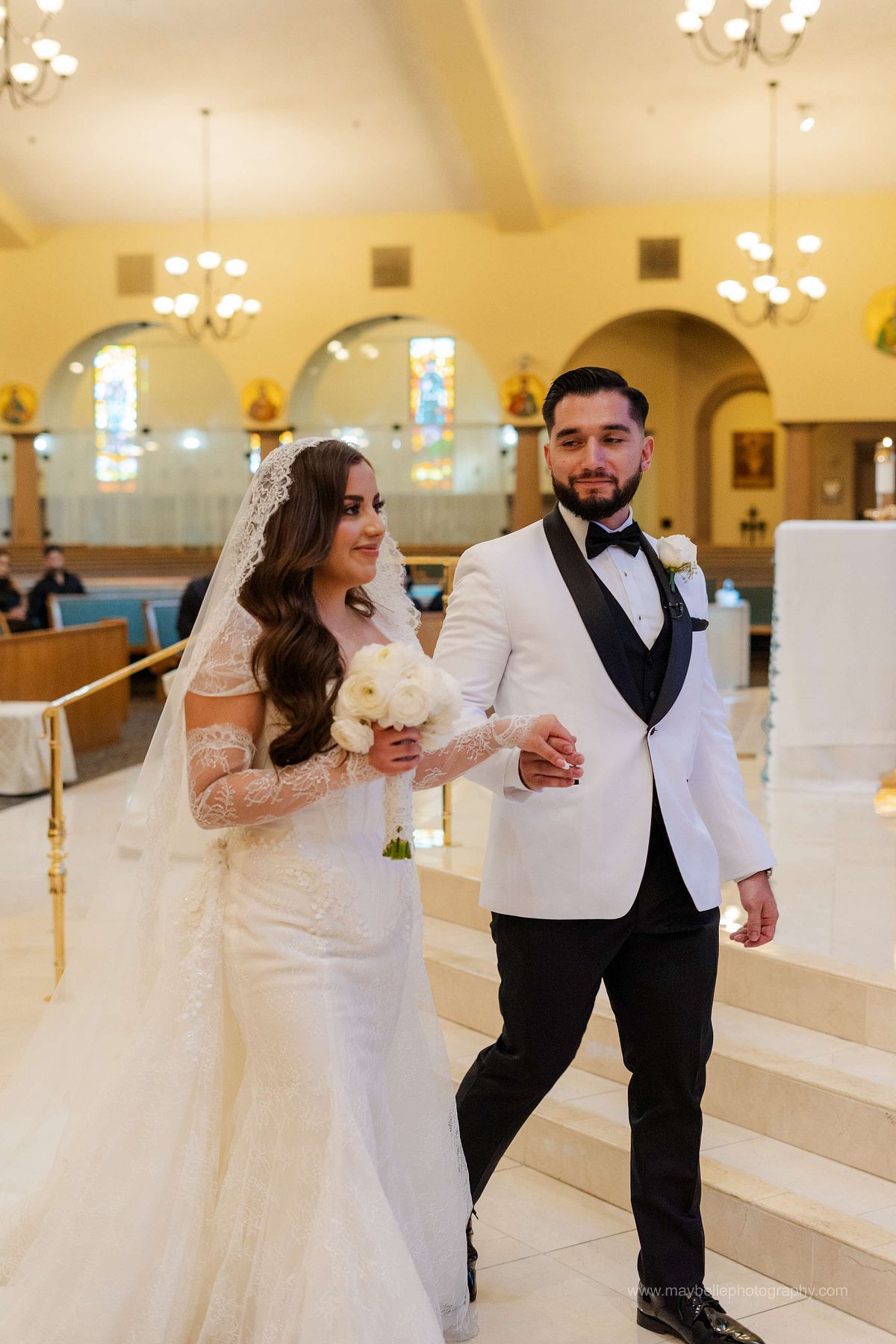 Exchanging vows at Saint Joseph, Husband of Mary Roman Catholic Church in Las Vegas Wedding Photography