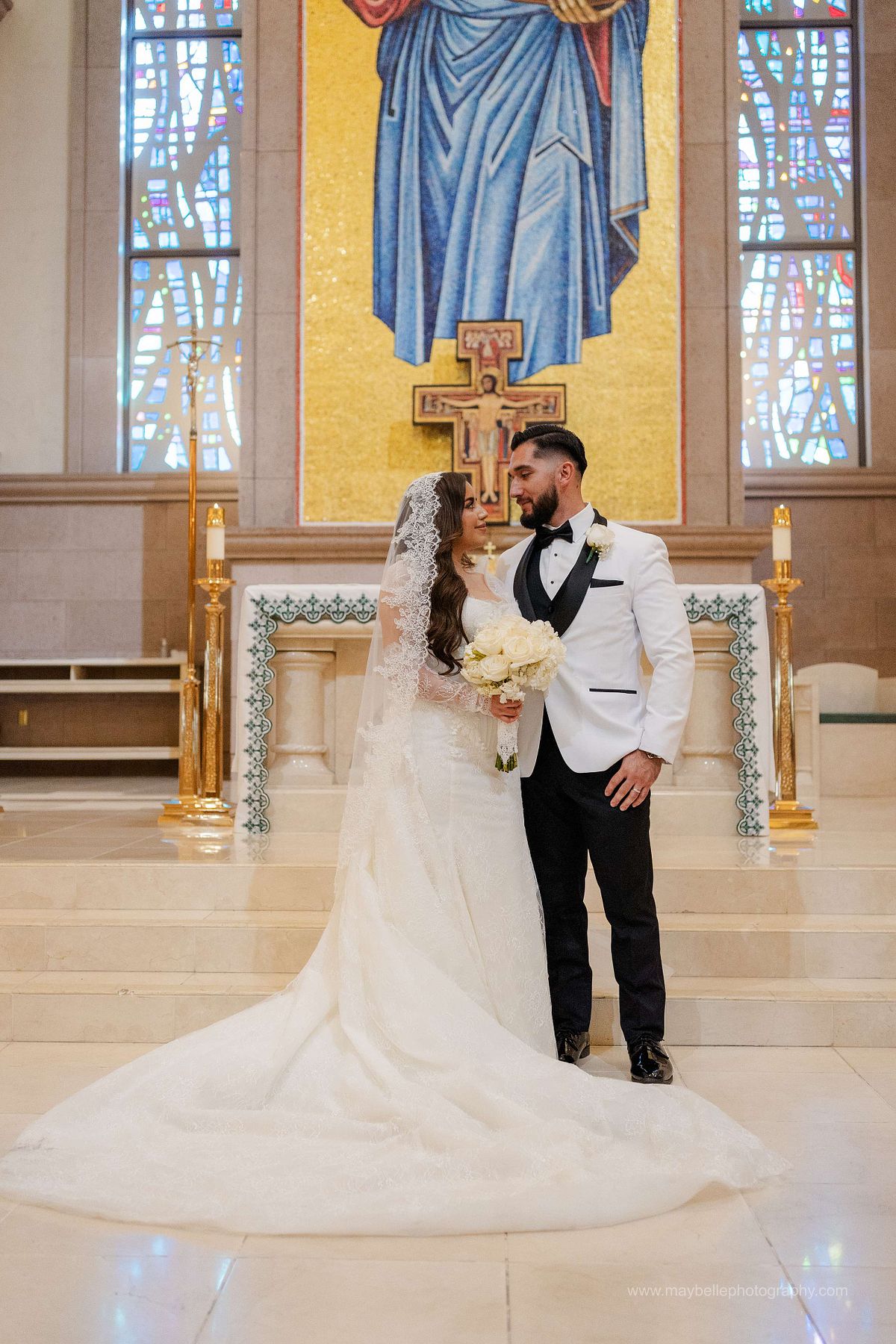 Exchanging vows at Saint Joseph, Husband of Mary Roman Catholic Church in Las Vegas Wedding Photography