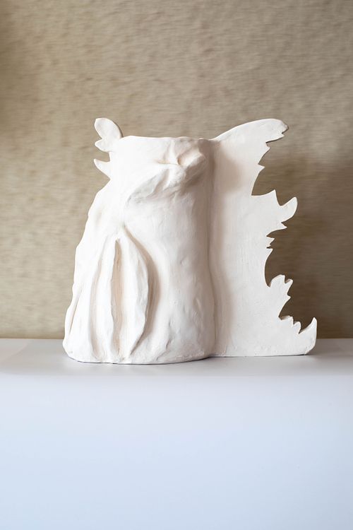 Handmade abstract ceramic sculpture representing quantum energy and negative space.