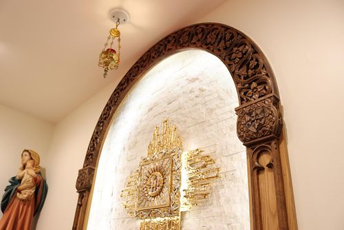 new hand-carved arch over tabernacle in Dominican Sisters' Chapel in Columbus, Ohio