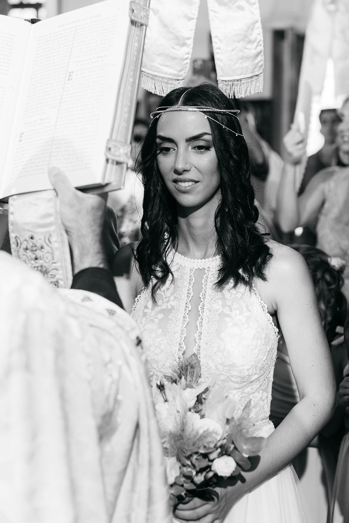 beautiful bride during wedding ceremony in Petra Lesvos Greece church &ndash; destination wedding photographer