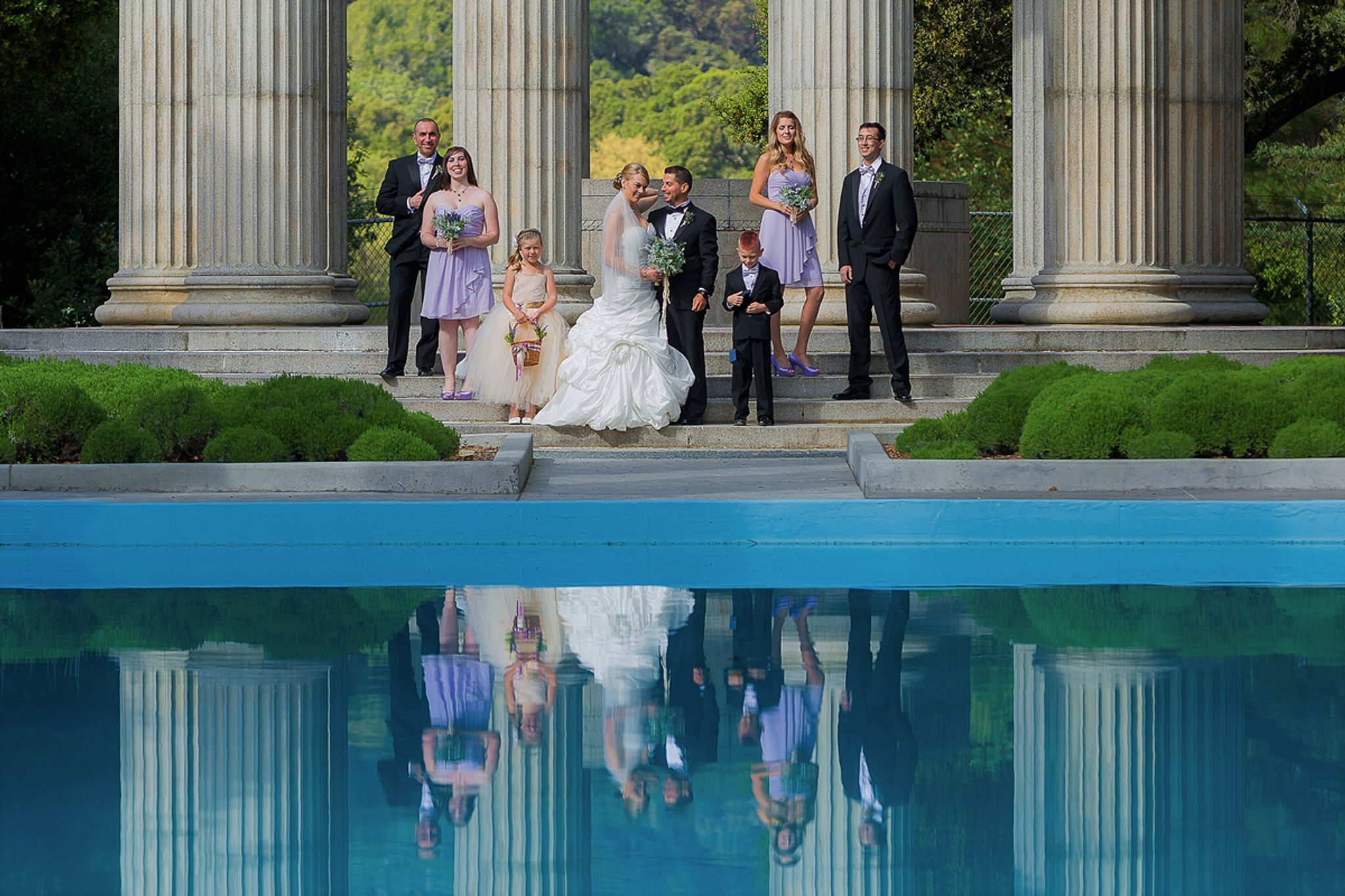 Reflective wedding party at Pulgas Water Temple
