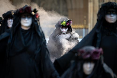 Extinction Rebellion Oil Slickers stage Whitehall action over failure to meet 1.5°C target