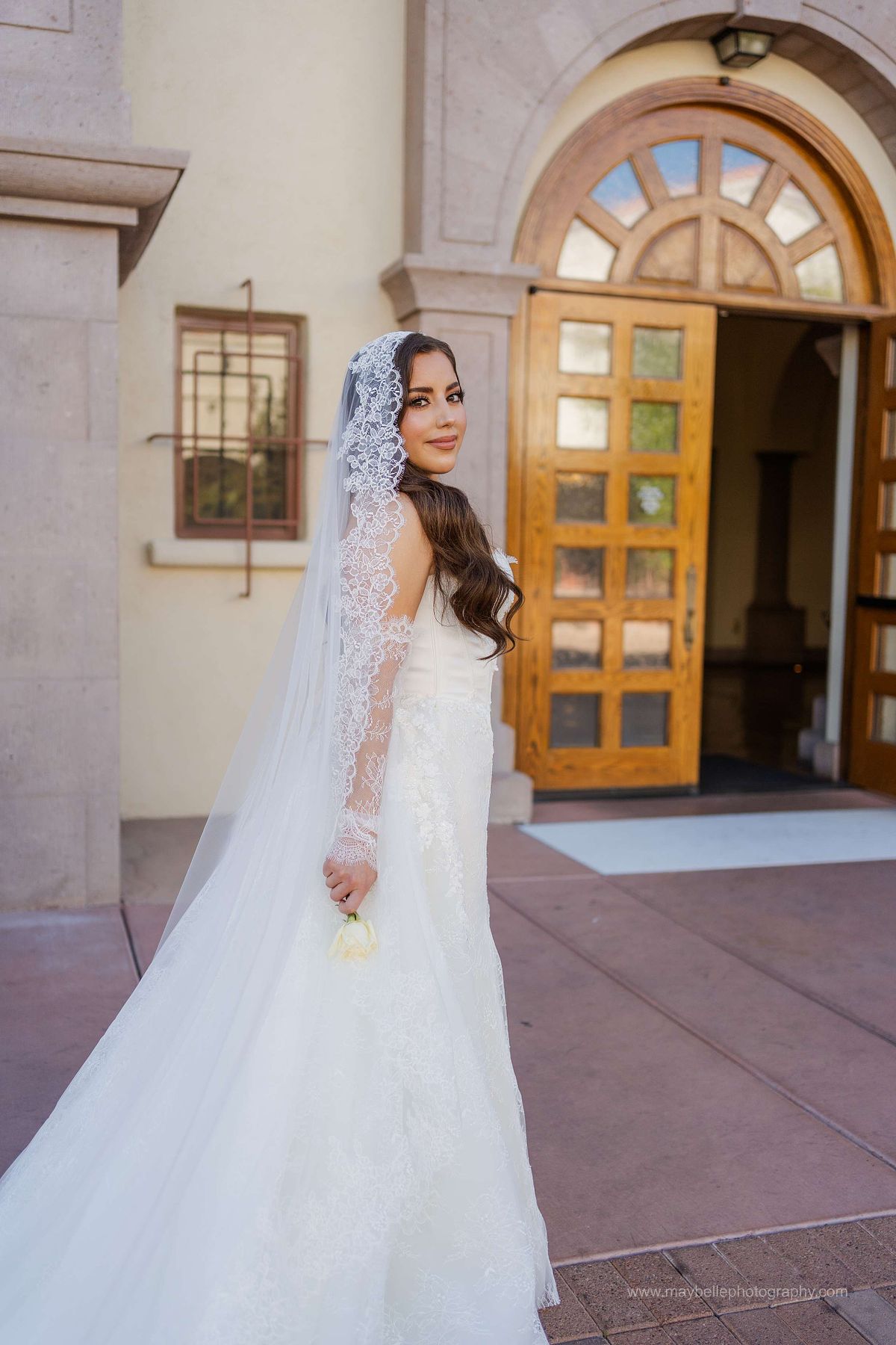 Exchanging vows at Saint Joseph, Husband of Mary Roman Catholic Church in Las Vegas Wedding Photography