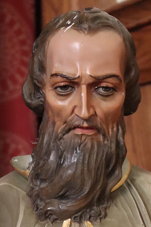 Close up of St Jude statue face in need of restoration