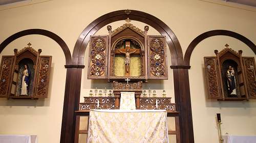 Showing the three primary shrines in the sanctuary at St. Bernadette's.