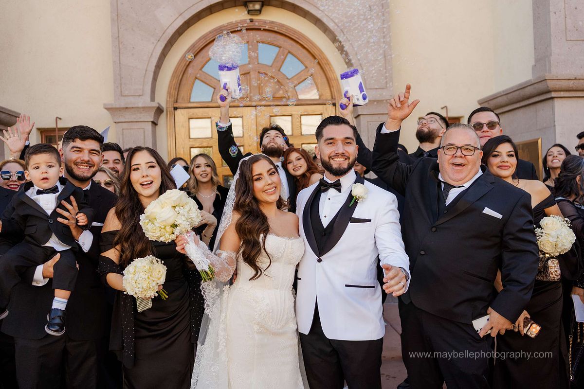 Bubble Exit at Saint Joseph, Husband of Mary Roman Catholic Church in Las Vegas Wedding Photography