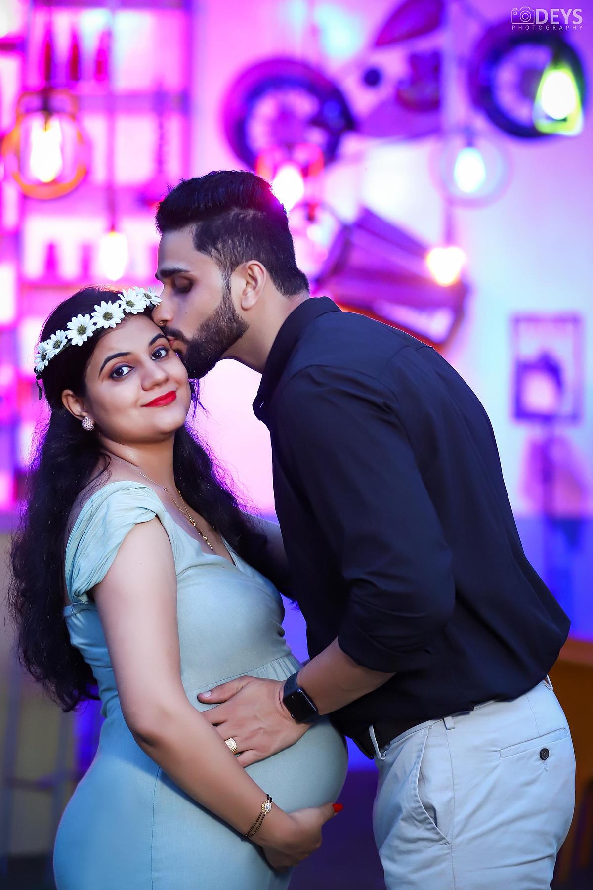 Maternityphotoshoot with husband at theme studio in Delhi NCR