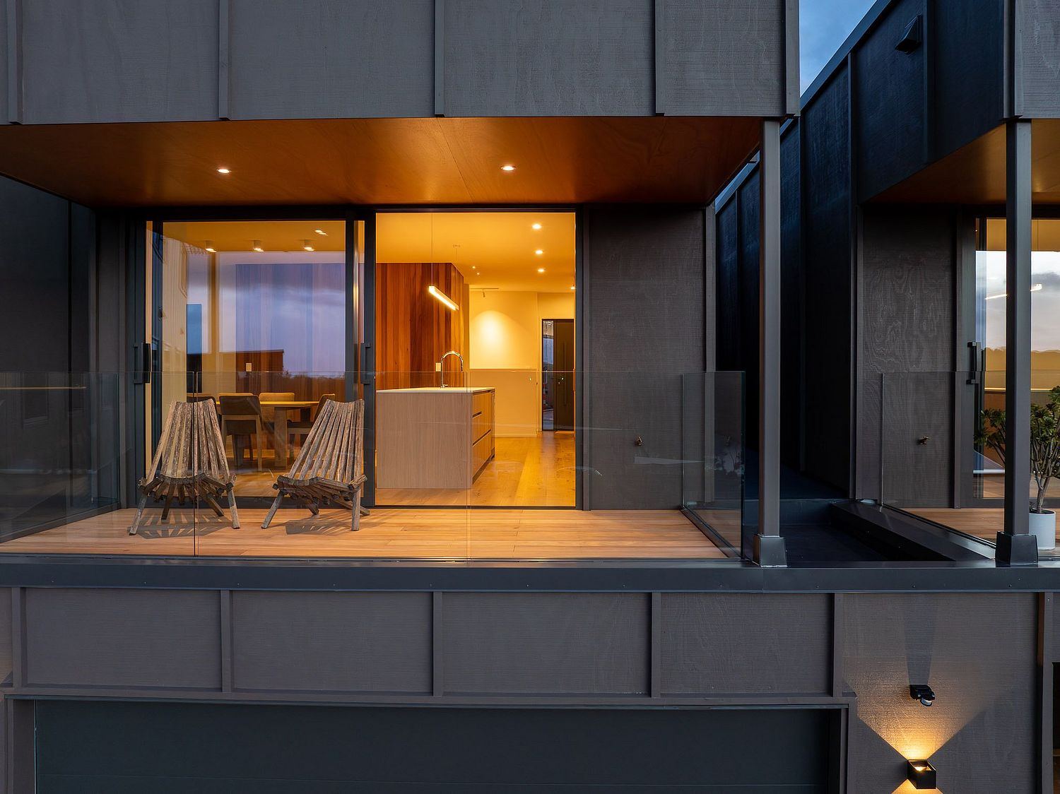 Close-up architectural detail of a luxury balcony at the West Village, Rangitahi Peninsula by Flax Cove Studio.