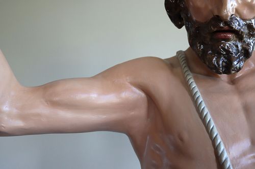 St John the Baptist statue arm repaired