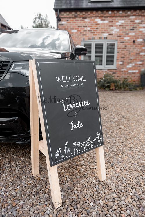 Bride-and-groom-listening-to-officiant-at-Oakham-Registry-Office