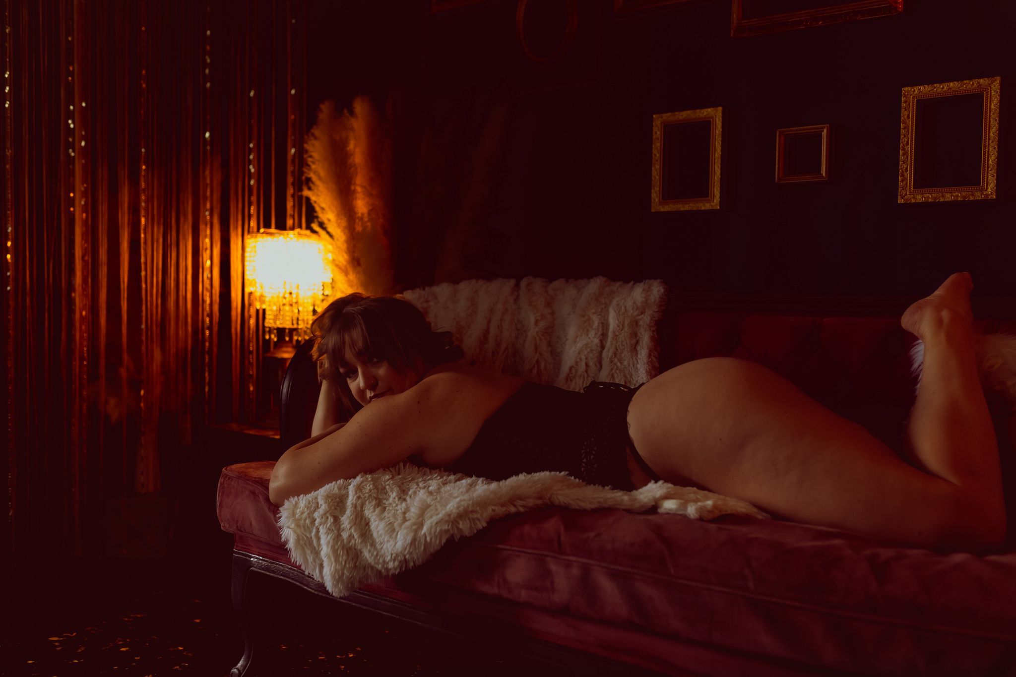 Empowering boudoir photo shoot inside private Willcox Arizona studio, complete with hair and makeup services, outfit options, and a comfortable, body-positive atmosphere for clients from Tucson, Sierra Vista, Tombstone, and Benson
