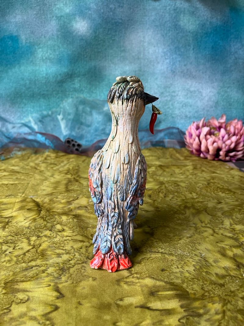 Woodpecker with a prey