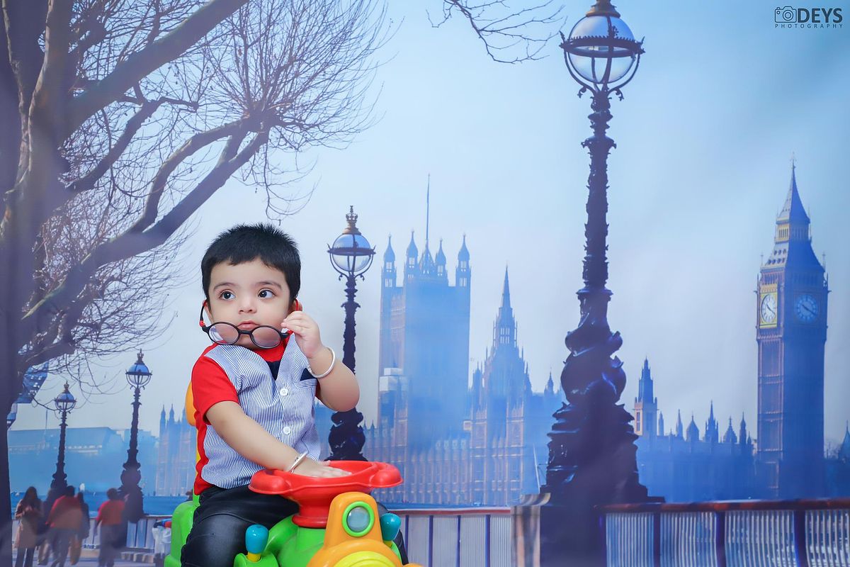 Pre first birthday photoshoot of boy at indoor at home with beautiful backdrop