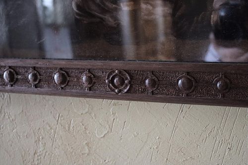 detail of some of the Celtic strapwork on the carved frame