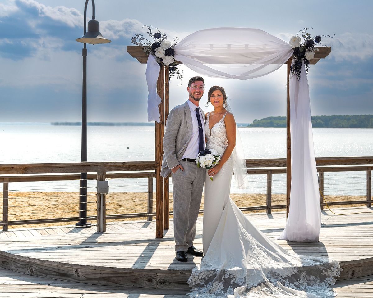 bride and groom posing after ceremony at hyatt in dewey beach, delaware